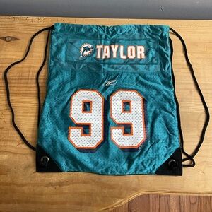 Teal Drawstring Bag with Number 99. Miami dolphins